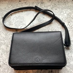 Onyx leather crossbody bag by Dagne Dover.